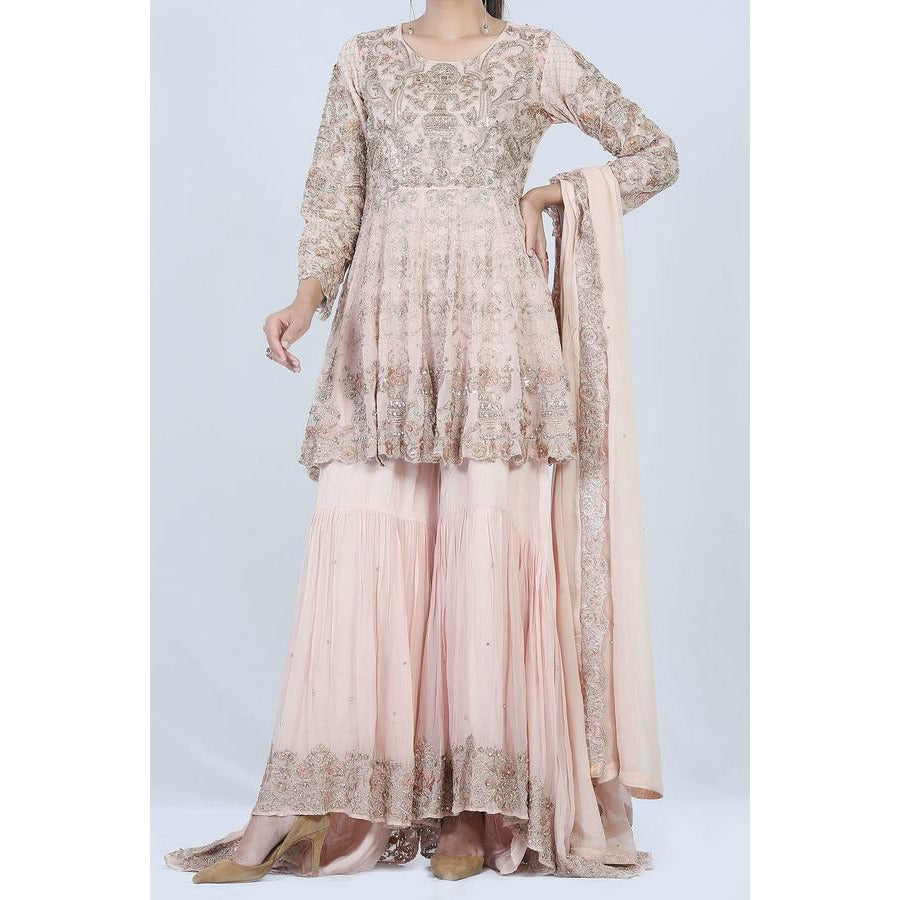 Pink short peplum style dress Chic Couture by Farah Pink short peplum style dress Chic Couture by Farah