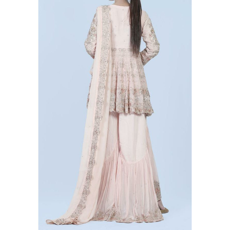 Pink short peplum style dress